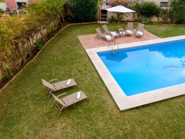 Rectangular swimming pool in front of terrace