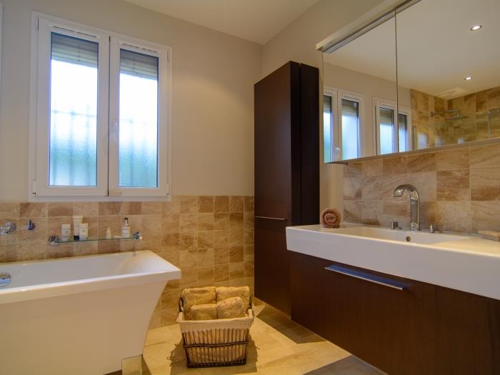 En suite bathroom with elegant appliances