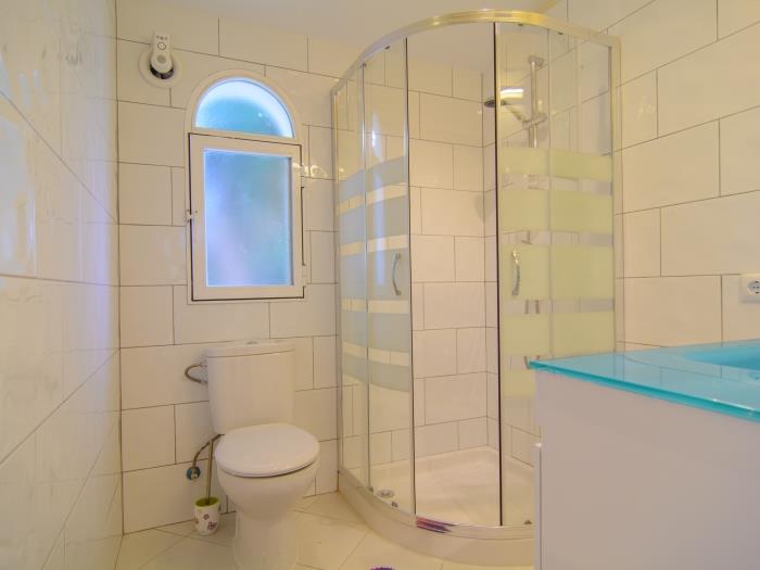 Family bathroom with walk in shower and sink