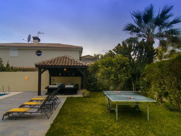 Manicured garden with ping pong table