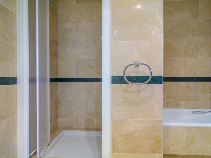 Fully equipped bathroom with walk in shower