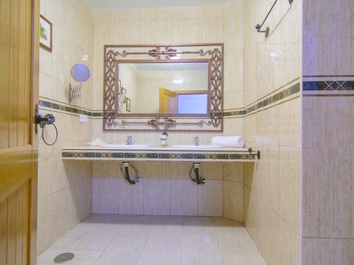 En suite bathroom, double sink and walk in shower
