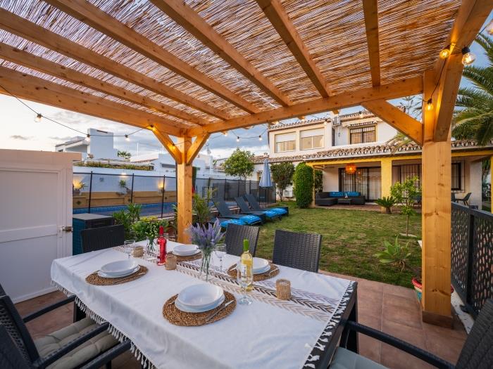 Spacious garden with pool, sun loungers, outdoor BBQ and terrace