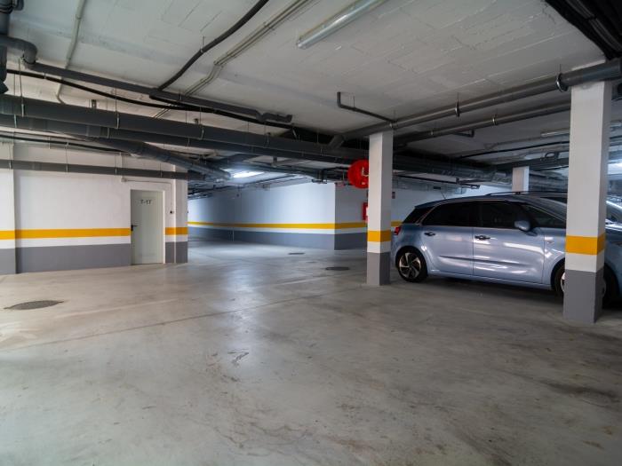 Basement that has two private parking spots