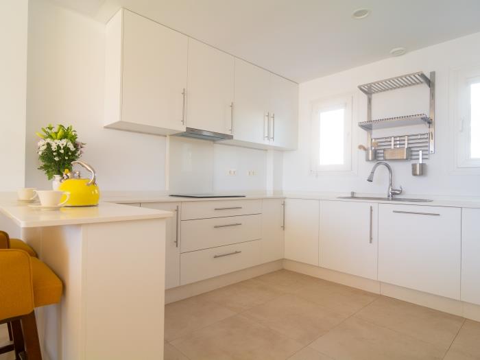 Brand new bosch appliances in 12m2 open plan kitchen with complete kitchenware