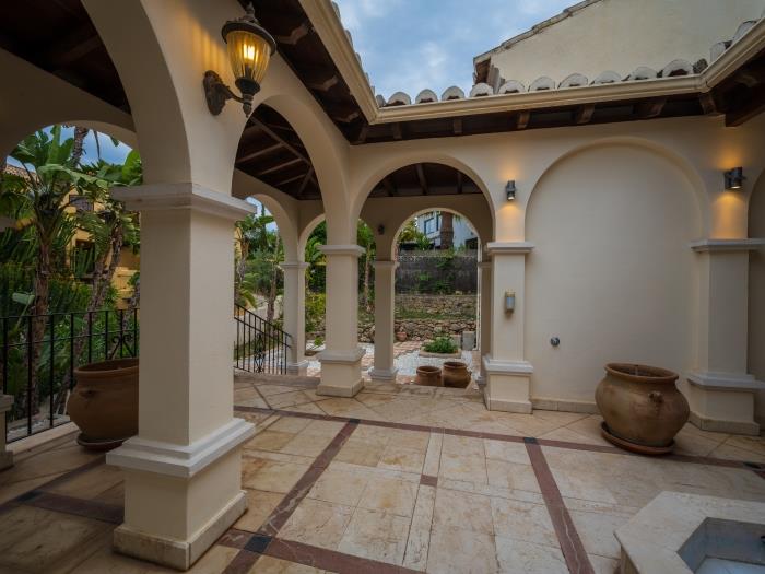 Mediterranean architecture with marble floors, columns with arches
