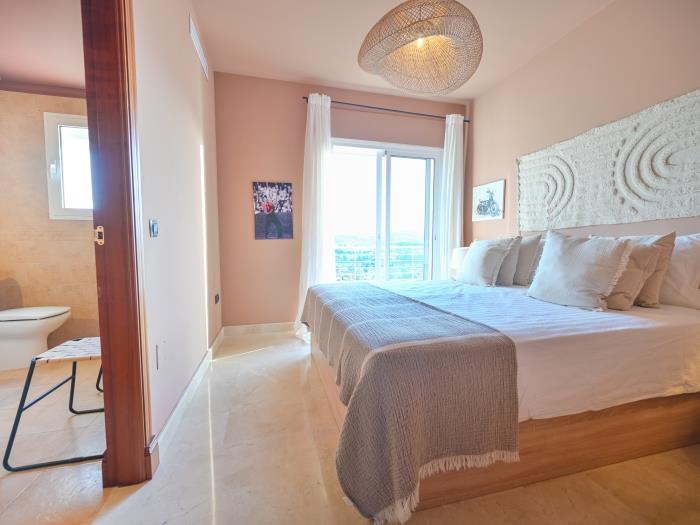 Bedroom with exit to terrace with mountain views