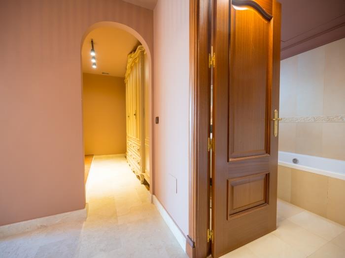 Bedroom with en suite bathroom and spacious wardrobe