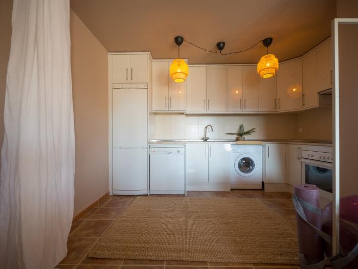 Open plan kitchen with all the needed equippment