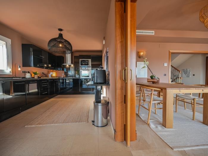Open plan kitchen with all the needed equippment